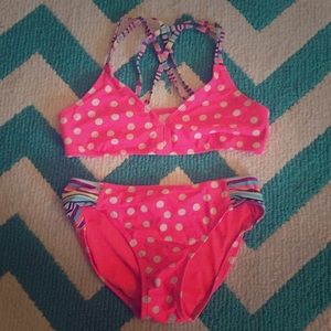 Pink and white Polk-a-dot bikini with rainbow side